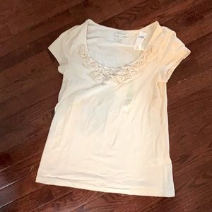 Banana Republic short sleeved rosette trimmed top.